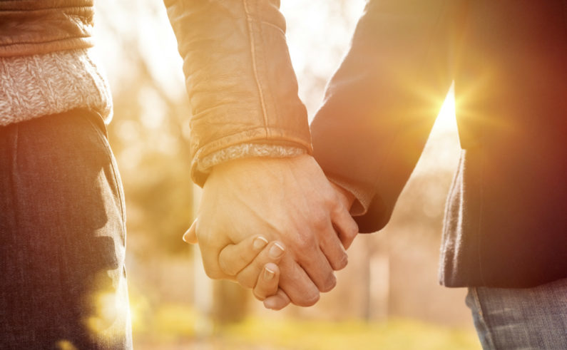 Couple holding hands final