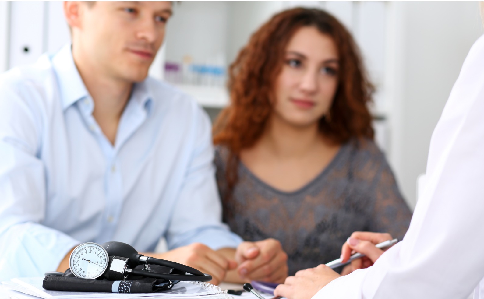 medical manometer lying on table while doctor consult picture id984018778